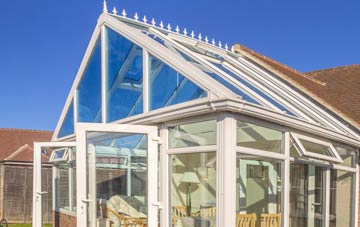 conservatory roof insulation costs Betws Garmon